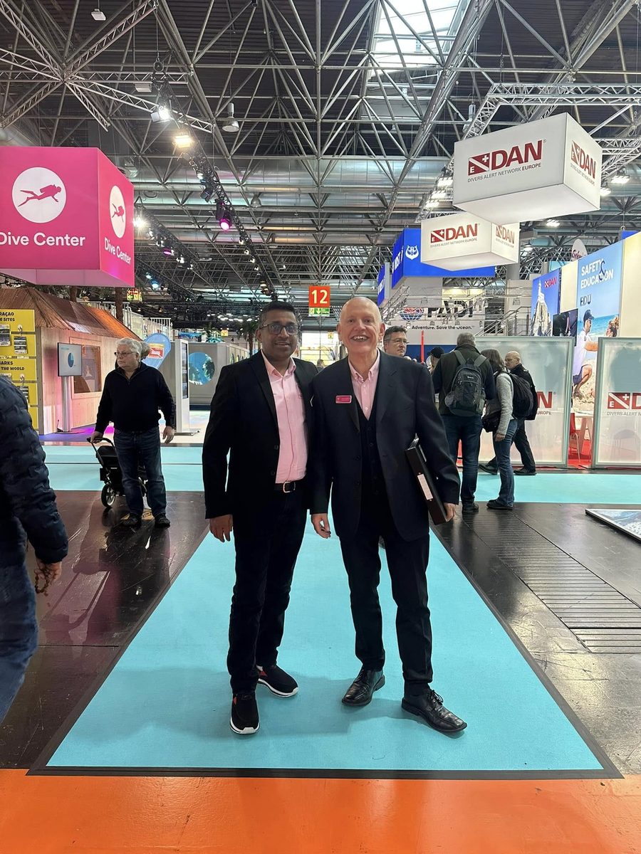 Sanjeev Gabriel with a colleague at a large international trade fair
